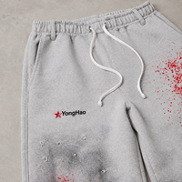 Fabricant de vêtements personnalisés OEM ODM : Pantalons de survêtement larges pour hommes, effet délavé vintage, imprimé graphique, style streetwear