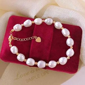 Bracelets et joncs de style occidental européen et américain, à la mode, avec perles fantaisie, minimalistes, baroques, en perles d'eau douce, Double Eleven Drainage - Product Image 1