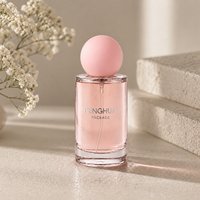 Flacon de parfum en verre transparent de 50 ml/100 ml avec bouchon rose, forme cylindrique, vaporisateur à pompe, rechargeable, logo personnalisé disponible