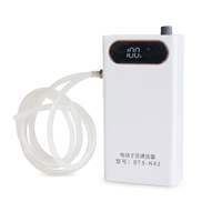 Appareil de lavage utérin électrique portable avec une capacité de 500 millilitres et une batterie rechargeable longue durée