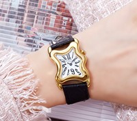 Montre vintage à boîtier papillon torsadé effet fondant pour femme, montre à quartz étanche haut de gamme avec bracelet en cuir