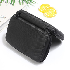 กระเป๋าเก็บของ EVA สำหรับหูฟังแบบพกพา กล่องกันกระแทกสีดำ กล่องบรรจุภัณฑ์ชุดหูฟังบลูทูธดิจิตอลอเนกประสงค์ - Product Image 1
