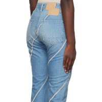 Lignes de biais parallèles taille moyenne femme Rivet Denim pantalon Bootcut décoloration bleu coton lavé Long Jean femmes décontracté évasé Jeans