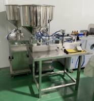 Machine de remplissage pneumatique à double tête et deux buses pour le remplissage de crème cosmétique, sauce tomate, pâte, miel