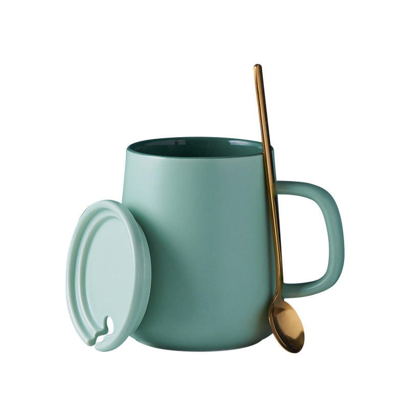 Two-tone green cup with lid and spoon