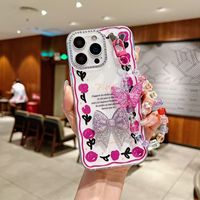 Coque de téléphone de luxe antichoc 3D avec nœud papillon et motif tulipe pour A17/A15/A13/A04e avec dragonne papillon – Vente en gros