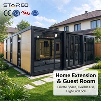 Maison conteneur pliable et extensible à double aile de 40 pieds, avec structure en acier haute résistance sismique, 2 chambres, salle de bain principale, résidence rurale