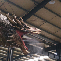 Effets stroboscopiques de fumée de Dragon noir mécanique dynamique de Dragon Animatronic crachant des flammes pour l'utilisation scolaire de centre commercial de parc à thème
