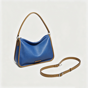Bolso de hombro de cuero granulado azul, con asa superior de contraste color canela y correa cruzada desmontable - Product Image 2