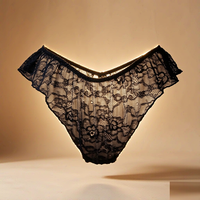 Ensemble de lingerie deux pièces pour femme, style exotique, avec broderie en dentelle, caraco long, panneaux transparents boutonnés sur le devant, culotte à volants et finition vintage 90%