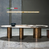 Table à manger ovale moderne de luxe en marbre artificiel italien avec base en métal pour la maison, les restaurants et les hôtels