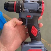 Perceuse à batterie lithium sans balais transfrontalière, visseuse électrique à percussion haute puissance trois fonctions 10 mm grande capacité
