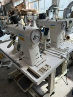 Machine à coudre industrielle d'occasion Juki DP-2100 à entraînement direct, à tête sèche, pour l'encolurement des manches, avec dispositif de programmation