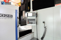 Centre d'usinage CNC à portique monobroche robuste 3 axes GMF4028R BT50 Fanuc pour fraisage et perçage