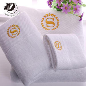 Juego de Toallas Blancas de Algodón 100% con Ribete Dobby y Logotipo Bordado para Hotel, Manos, Cara y Baño - Product Image 1