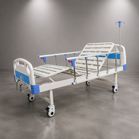 Lit d'hôpital avec tête de lit en ABS/PP, barreaux latéraux en alliage d'aluminium, plateau en forme de C et pieds en tube d'acier pour centre de réadaptation et usage infirmier