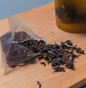 Thé noir biologique en vrac de Ceylan Dk Sachet de thé de haute qualité Feuille de thé vert noir Feuilles mobiles noires