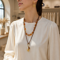 Collier de perles couleur ambre avec cordon réglable et pendentif, bijoux pour femme, tenue décontractée