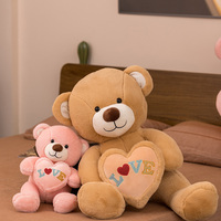 Ours en peluche de saint-valentin avec cœurs assortis, vente en gros, design fantaisie créatif, tenir le cœur