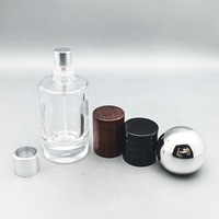 Atomiseur de luxe rond droit rechargeable de 30ml vaporisateur bouteille de parfum en verre transparent avec divers bouchon de pulvérisation de parfum
