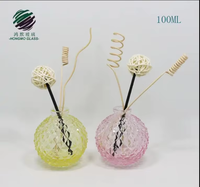 Huile essentielle de bouteille en verre de forme d'ananas de la conception unique 100ml pour le diffuseur pour l'emballage cosmétique avec la couleur adaptée aux besoins du client