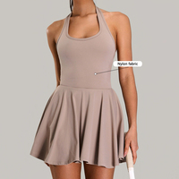 Combinaison de sport pour femme anti-attraction, dos nu, style jupe de tennis, pour sports de plein air, fitness, course à pied, couleur unie, col licou