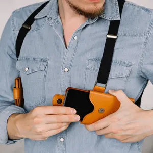 Bolso de pecho de alta calidad para hombre, mochila de cuero para teléfono móvil, a la moda