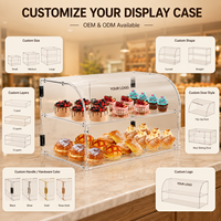 Vitrine de boulangerie commerciale en acrylique avec accès par porte arrière et étagères amovibles pour garder les bagels, gâteaux et biscuits frais