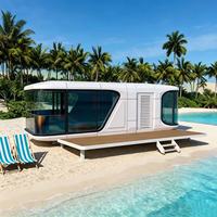 Cabane de luxe préfabriquée pour glamping sur la plage, maison-capsule portable, cabine mobile, design panoramique en verre, tente d'hôtel de villégiature extérieure pour camping en bord de mer