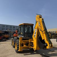 Chargeuse-pelleteuse JCB 4CX d'occasion à direction intégrale, moteur JCB d'origine, godet frontal de 1,2 m³ pour la construction et la réparation routière