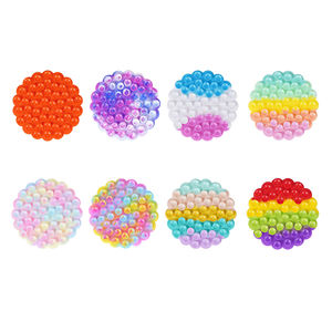 Jouet à succion rond double face Squidopops en silicone souple anti-stress à presser - Product Image 2