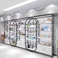 Vitrine de présentation cosmétique personnalisable GZowin en métal et bois avec éclairage LED, durable et facile à nettoyer pour les magasins de détail