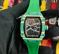 Montre mécanique squelette tendance pour homme avec boîtier tonneau, mouvement visible et bracelet textile orange
