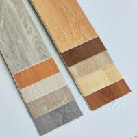 Plancher en PVC SPC imperméable de conception moderne, 4 mm à 8 mm, résistant à l'usure, installation par clipsage, pour supermarchés et salles de sport