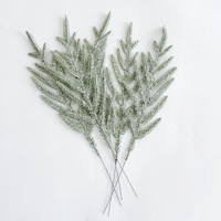 Vente chaude nouveau modèle accessoires de décoration de guirlande de noël à la main branche d'aiguille de pin artificiel doux floqué doux