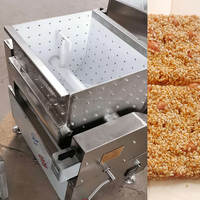 Machine à couper les barres de cacahuètes et de granola Moxin |   Ligne de production automatique de barres de céréales et de nougat