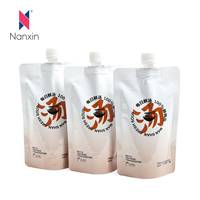 Pochettes souples de 200 ml de qualité alimentaire pour boissons avec bouchon verseur et embout de succion, emballage efficace pour l'eau, 100 pièces par emballage