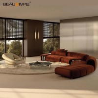 Canapé modulaire inclinable de luxe minimaliste italien à volants, en tissu et cuir garnis d'éponge, pour salon de villa