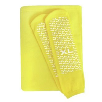 Chaussettes antidérapantes de couleur de taille de matériau personnalisée pour l'ensemble jaune de chaussettes antidérapantes de centre de soins de santé d'hôpital