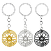 Porte-clés publicitaires en métal rotatifs vierges pour véhicules, gravure laser de logo, cadeaux d'entreprise, souvenirs, vente en gros