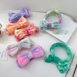 ที่คาดผมผ้าฟลานเนลลายไล่สีแบบผูกโบว์สำหรับผู้หญิง สไตล์หวาน ใช้สำหรับแต่งหน้า ล้างหน้า ดูแลผิวหน้า - Product Image 1
