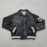 Blouson Bomber en Similicuir Doublé Polaire Noir avec Logo Personnalisé en Chenille et Rayures Côtelées Style Baseball