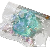 Vente en gros : Jouet Squishy Patte de Chat Transparente en Cristal Ultra Doux Tendance Kawaii, Anti-stress en TPR, Portable, Boîte Mystère