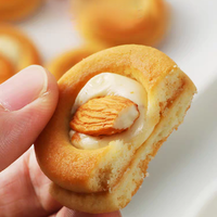 Délicieuses collations bienfaisantes : biscuits à l'amande et pizza pour le thé de l'après-midi