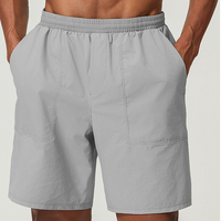 Vente chaude hommes sportif léger Shorts d'entraînement doux Spandex extensible coupe sèche uni blanc Nylon décontracté Shorts de course