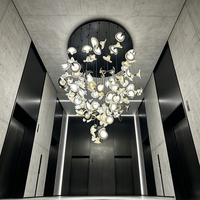 Lustre en verre cristal à pétales irréguliers de luxe, suspension créative sculpturale pour hall d'ascenseur et éclairage de projet à plafond haut