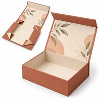 Boîte rigide magnétique pliable personnalisée avec un design botanique en terre cuite pour l'emballage de cadeaux naturels de compléments bien-être