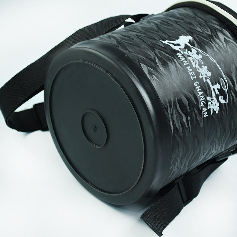 Black round bucket for fish feeding