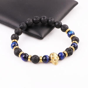 Di Yiwu Fabbrica di Gioielli Affittare Che Fanno Pietra Lavica Naturale Blu Occhio di <span class=keywords><strong>Tigre</strong></span> In Rilievo In Acciaio Inox Fascino Del Cranio Braccialetto Elastico Degli Uomini - Product Image 4