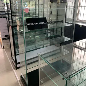 Utilisation haut de gamme disponible en différents styles et couleurs Profil en aluminium Vitrine d'affichage en verre pour magasin de détail